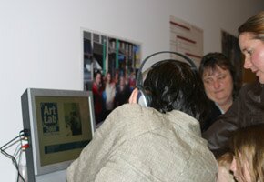 People listening to the podcasts at the exhibitions